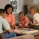 family playing board games