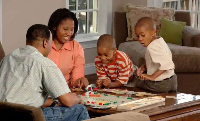 family playing board games